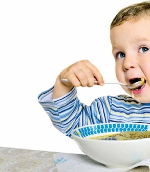 Image of boy eating.